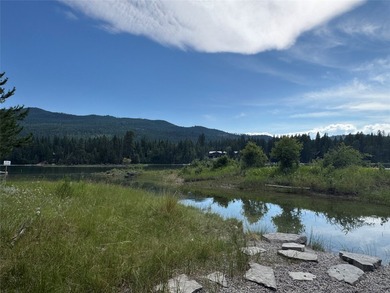 Tucked into a peaceful pocket near Swan Lake, this .67-acre lot - photo 23