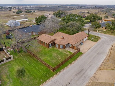 Welcome to this inviting 3-bedroom 3-bath home located in a - photo 4
