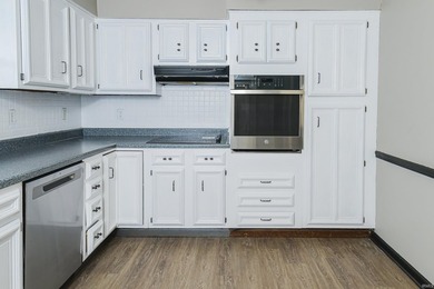 Priced well below assessed value of $422,800!! Nestled on a - photo 6