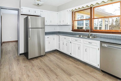 Priced well below assessed value of $422,800!! Nestled on a - photo 8