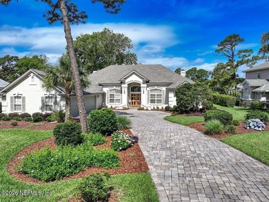 This beautiful one story pool home with water to golf views & - photo 1