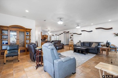 Situated on just over 4 acres in Lindale, this spacious property - photo 12