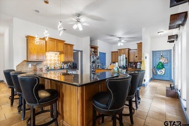 Situated on just over 4 acres in Lindale, this spacious property - photo 13