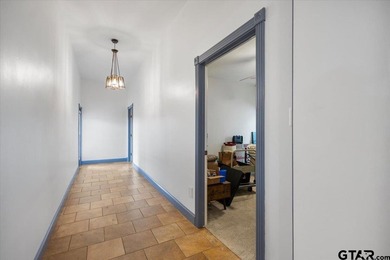 Situated on just over 4 acres in Lindale, this spacious property - photo 32