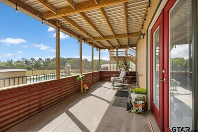 Situated on just over 4 acres in Lindale, this spacious property - photo 37