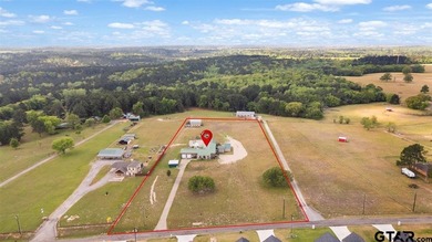 Situated on just over 4 acres in Lindale, this spacious property - photo 41