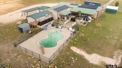 Situated on just over 4 acres in Lindale, this spacious property - photo 42