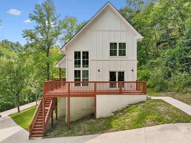 Nestled among mature trees in a desirable Center Hill Lake gated - photo 2