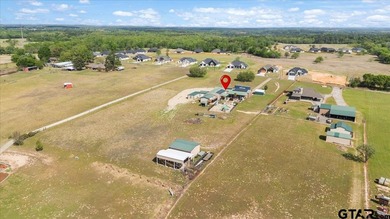 Situated on just over 4 acres in Lindale, this spacious property - photo 43