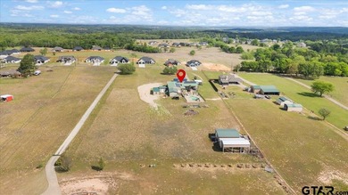 Situated on just over 4 acres in Lindale, this spacious property - photo 44