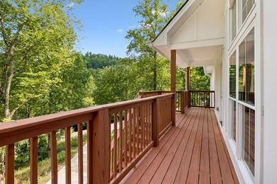 Nestled among mature trees in a desirable Center Hill Lake gated - photo 4