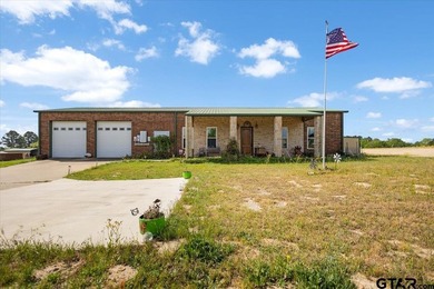 Situated on just over 4 acres in Lindale, this spacious property - photo 45