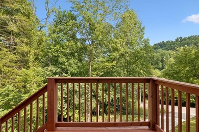 Nestled among mature trees in a desirable Center Hill Lake gated - photo 5