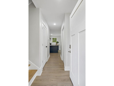 Nestled among mature trees in a desirable Center Hill Lake gated - photo 7