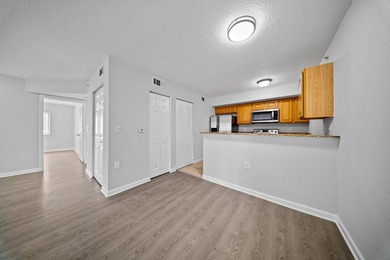 A spacious first floor 3 bedroom 2 bath condo located in a - photo 11