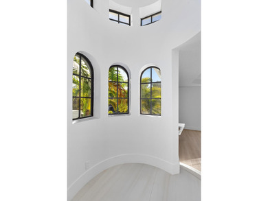 This classic Mediterranean estate in The Oaks has been - photo 30