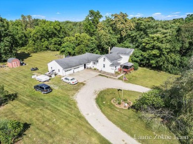 Lake Home For Sale in Coopersville, Michigan