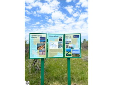 Enjoy Portage Lake views from this ideally located vacant parcel - photo 3