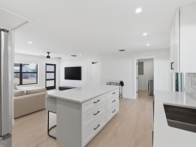 Fully remodeled in 2023, this Jupiter home feels like new - photo 13