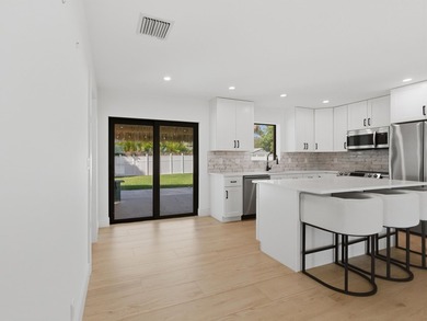 Fully remodeled in 2023, this Jupiter home feels like new - photo 14
