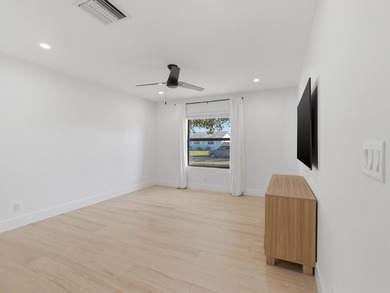 Fully remodeled in 2023, this Jupiter home feels like new - photo 17
