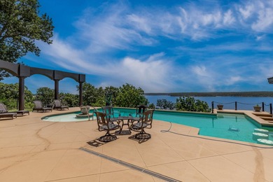 Indulge in luxury living at Eagle Bluff, where panoramic lake - photo 18