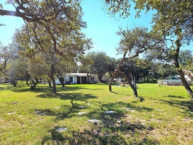 Discover the charm of this cinderblock home nestled on a - photo 2