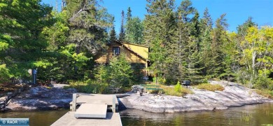 This boat access 53+ acre property was once part of the old Wolf - Lake Home For Sale in Crane Lake, Minnesota