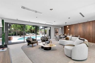 Featured on Netflix's Designing Miami, this fully renovated - photo 2
