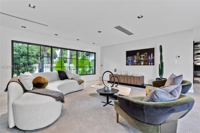 Featured on Netflix's Designing Miami, this fully renovated - photo 3