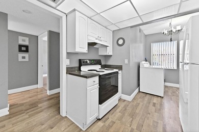 Discover this charming 2-bedroom, 2-bathroom ground floor - photo 7