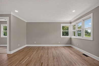 Completely remodeled and move-in ready! This beautiful brick - photo 4