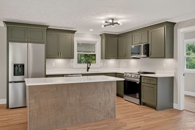 Completely remodeled and move-in ready! This beautiful brick - photo 6