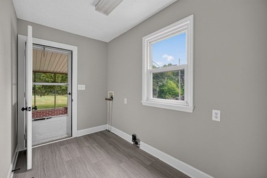 Completely remodeled and move-in ready! This beautiful brick - photo 10