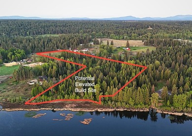 20 acres of PRIMARY LAKEFRONT on Eloika Lake! Several hundred - photo 3