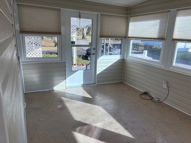 This is a must see property. Enclosed 4 season porch, separate - photo 13