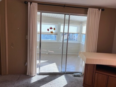 This is a must see property. Enclosed 4 season porch, separate - photo 14