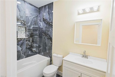 This newly built custom home offers refined living with - photo 22