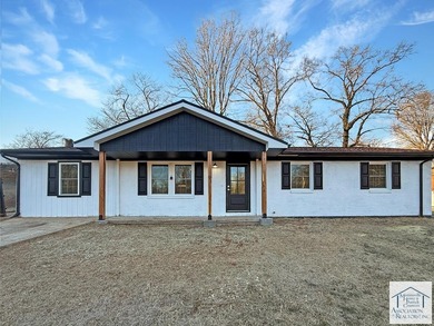 Beautifully renovated and move-in ready, this charming ranch