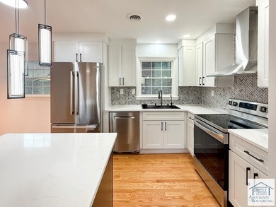 Beautifully renovated and move-in ready, this charming ranch