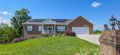 Custom-Built Brick Basement Ranch with Norris Lake Views! - photo 1