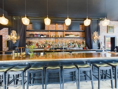 All of the hard work is done in this beautiful turnkey mixed-use