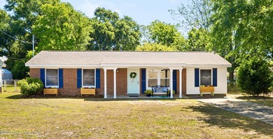 Welcome to a beautifully renovated 4-bedroom, 2-bath residence - photo 2