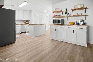 Welcome to a beautifully renovated 4-bedroom, 2-bath residence - photo 5