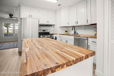 Welcome to a beautifully renovated 4-bedroom, 2-bath residence - photo 8