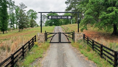 Still Mac Farm is a custom barndominium estate on 97 +/- acres - photo 2