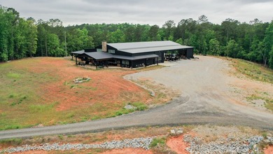 Still Mac Farm is a custom barndominium estate on 97 +/- acres - photo 4