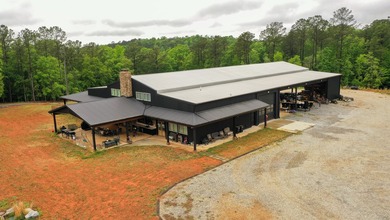Still Mac Farm is a custom barndominium estate on 97 +/- acres - photo 5