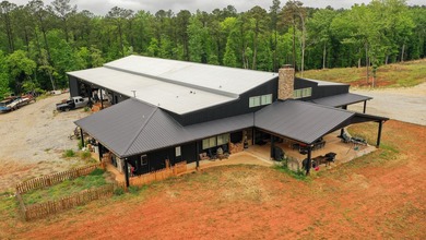Still Mac Farm is a custom barndominium estate on 97 +/- acres - photo 6