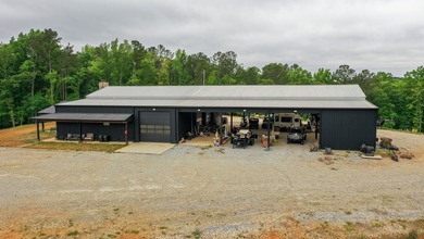 Still Mac Farm is a custom barndominium estate on 97 +/- acres - photo 7